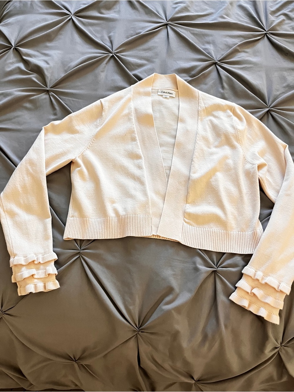 Calvin Klein Light Blush Cropped Cardigan with Ruffle Cuffs